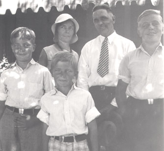 Guy, Mother, Dad, and Howard in 1932
